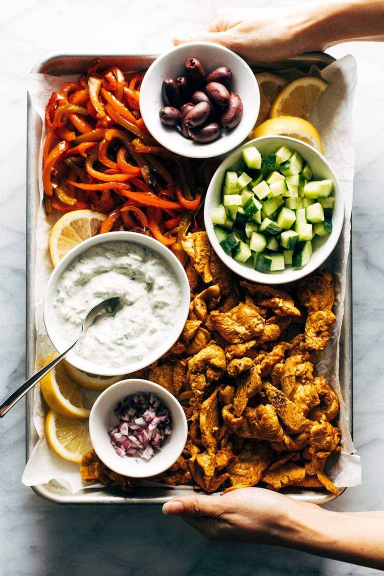 Sheet pan chicken with tzatziki and veggies.