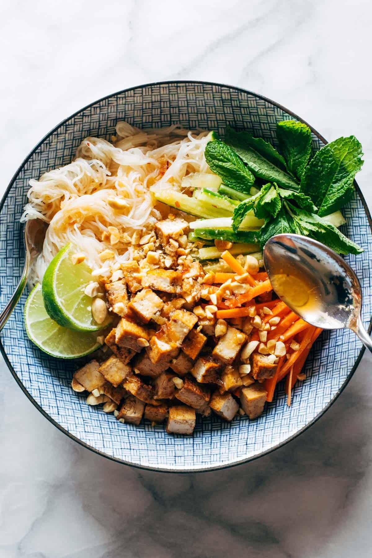 Vermicelli salad in a bowl with tofu.