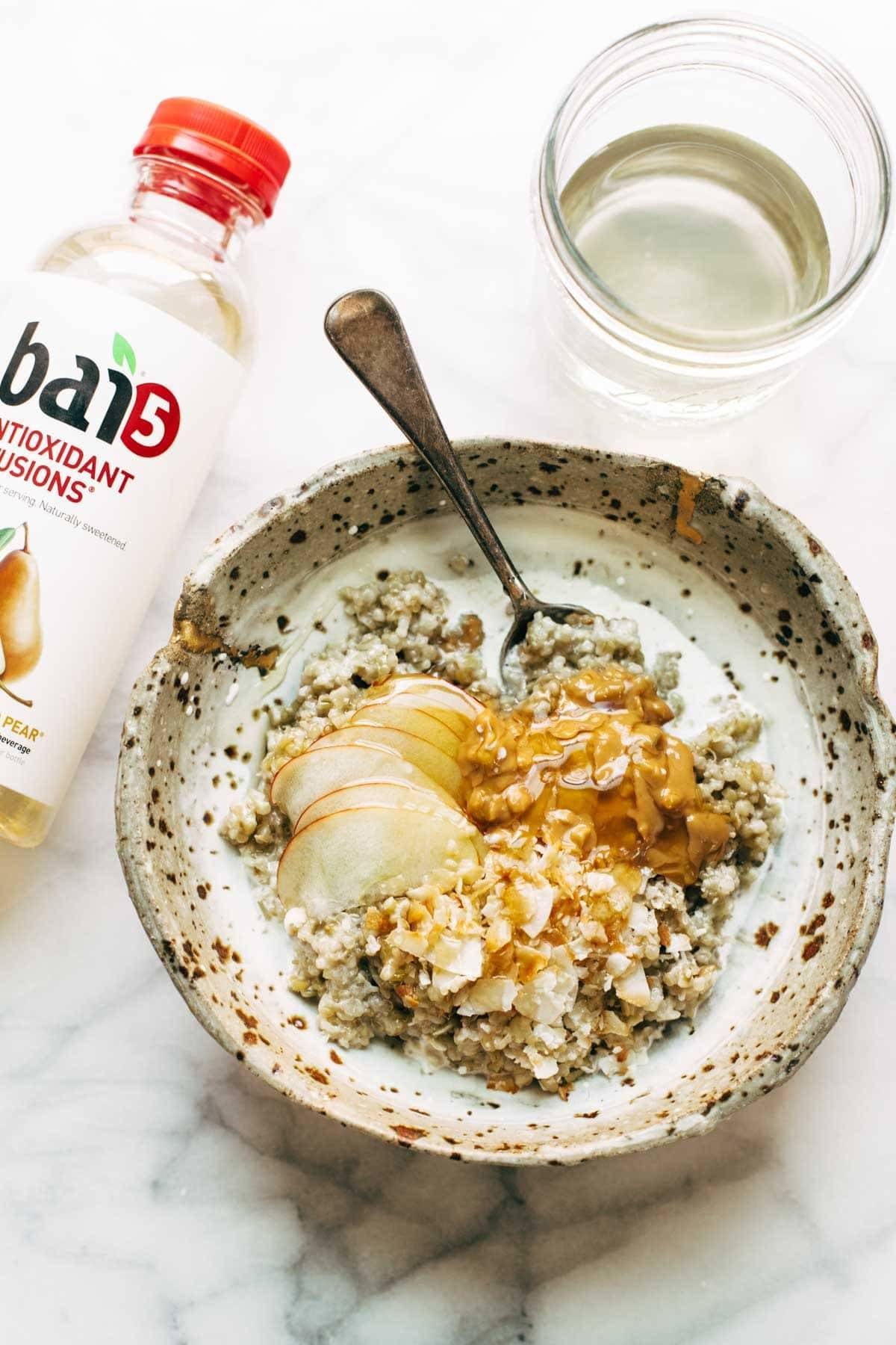 Simple Coconut Breakfast Porridge - a wholesome and cozy breakfast recipe with quinoa, oats, coconut milk, and one surprise ingredient! | pinchofyum.com