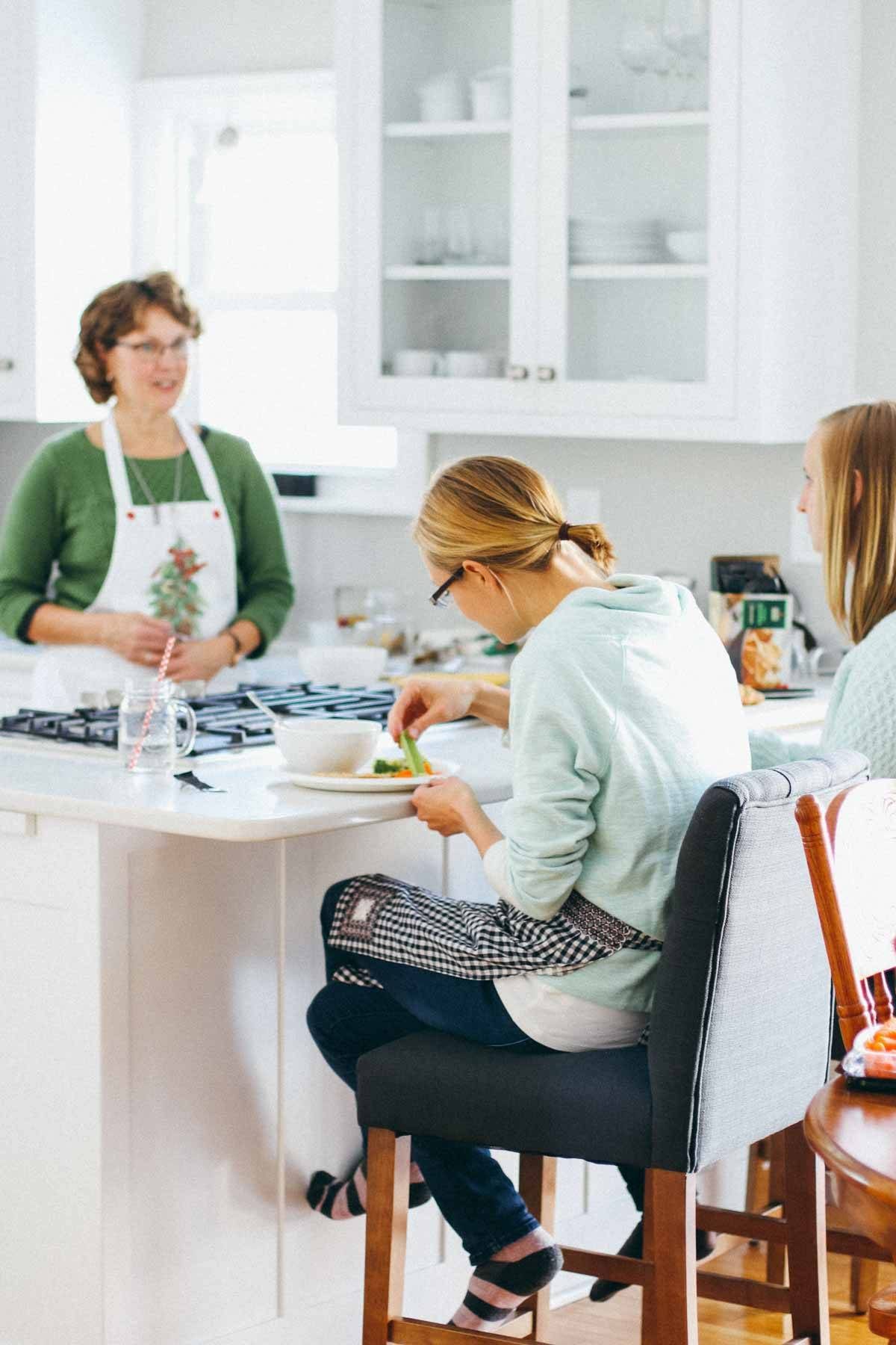 Women baking in a kitchen.