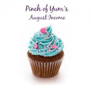 Pinch of Yum's August Income with a cupcake.