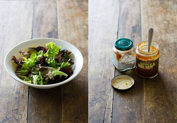 Bowl of greens and jars of apple chutney.